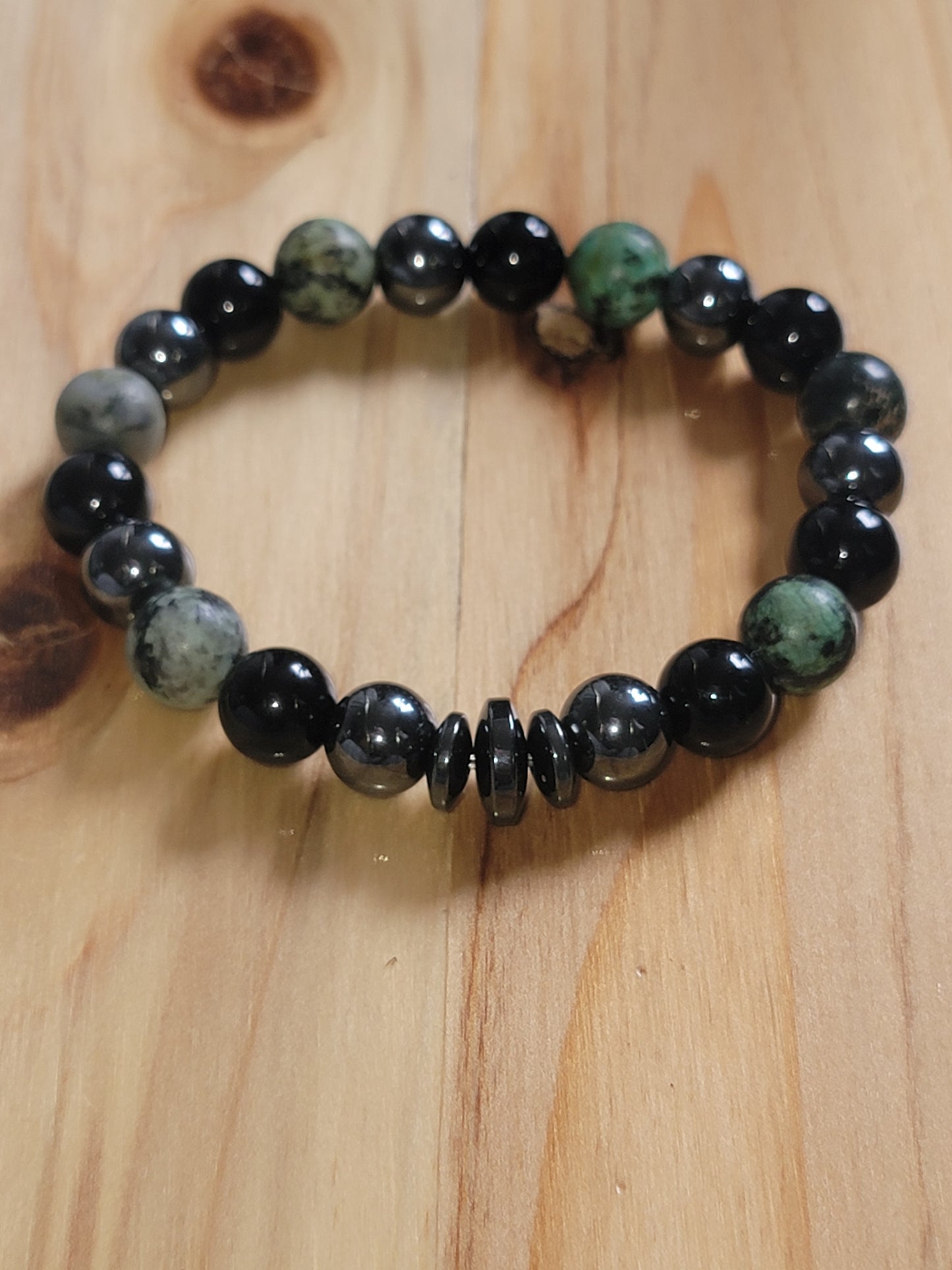 Pulsera de cuentas de ónix, hematita y turquesa africana